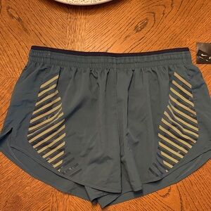 Nike Women’s Teal Shorts with Black and Yellow Stripes